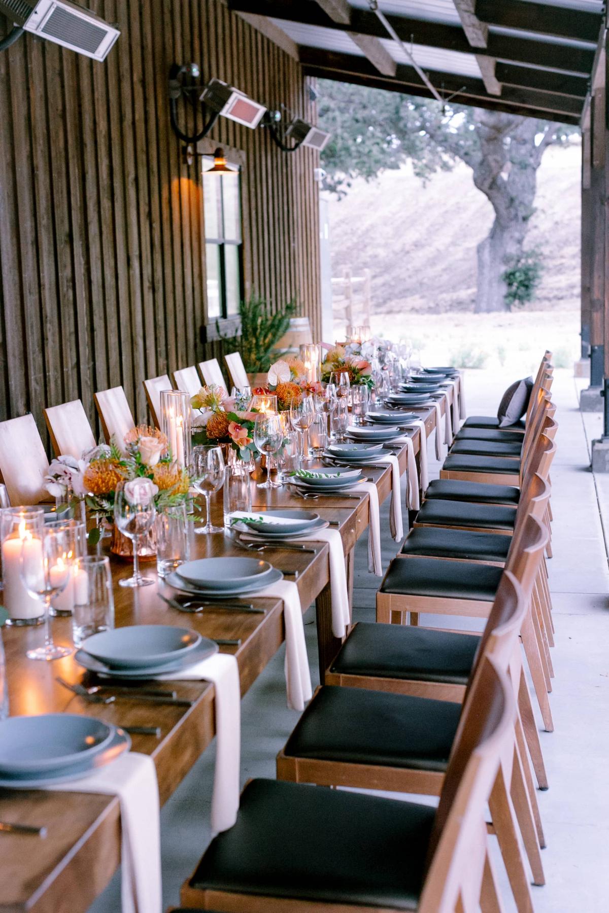 Side View of Long Reception Table on Veranda for Mika & James's Wedding