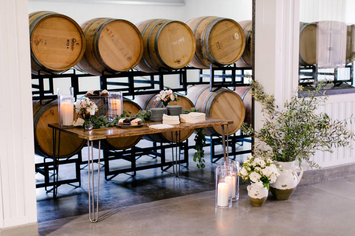 Wide Angle of Barrels, Flower Arrangements & Desert Table for Danielle & Jake's Wedding