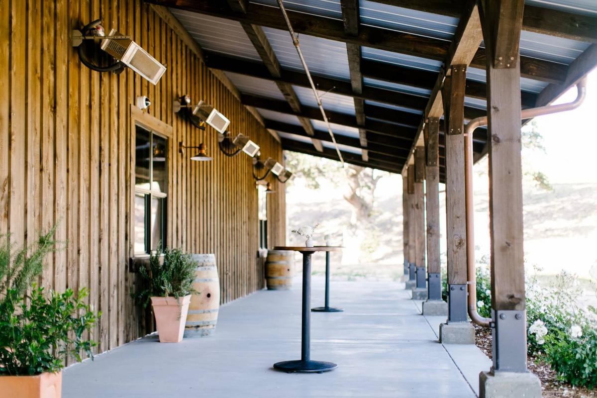 Petros Winery Porch with Bar Tables for Danielle & Jake's Wedding