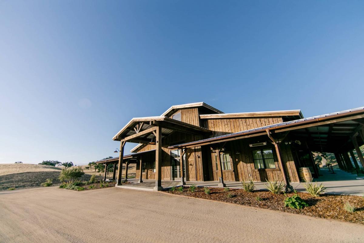Side Angle of Petros Winery with Blue Sky Behind
