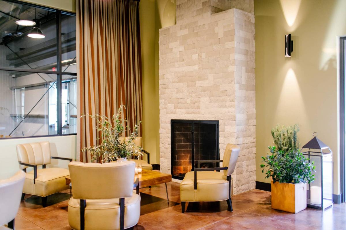 Petros Winery Reception Area with Chairs, Coffee Tables & Fireplace