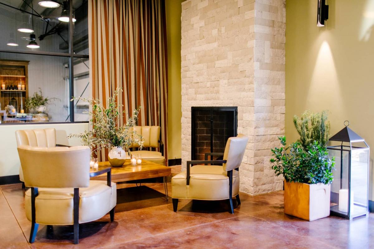 Petros Winery Reception Area with Chairs, Planters & Glass Candle Holder
