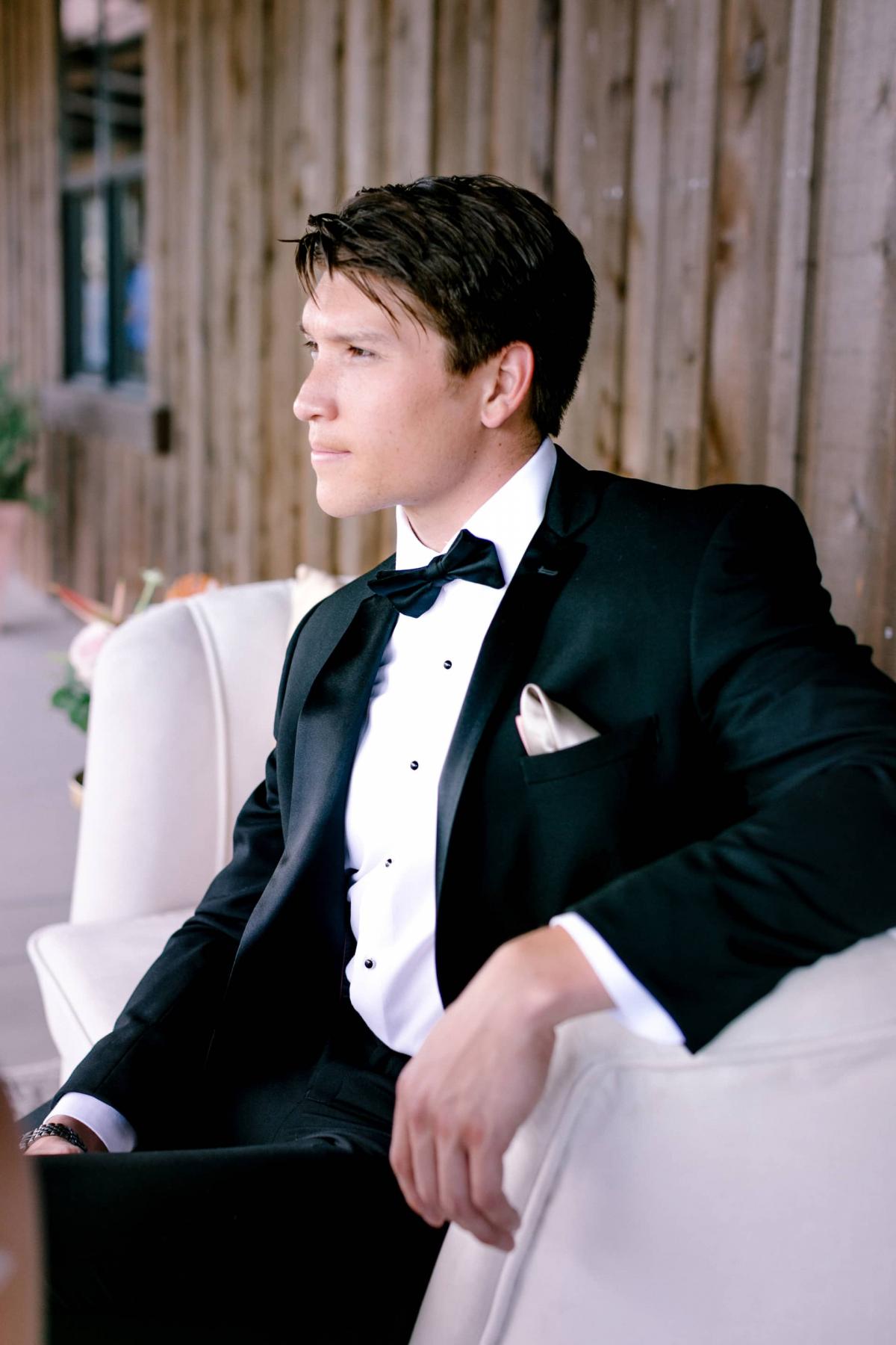 Groom Looking Out Over Petros Winery for Mika & James's Wedding