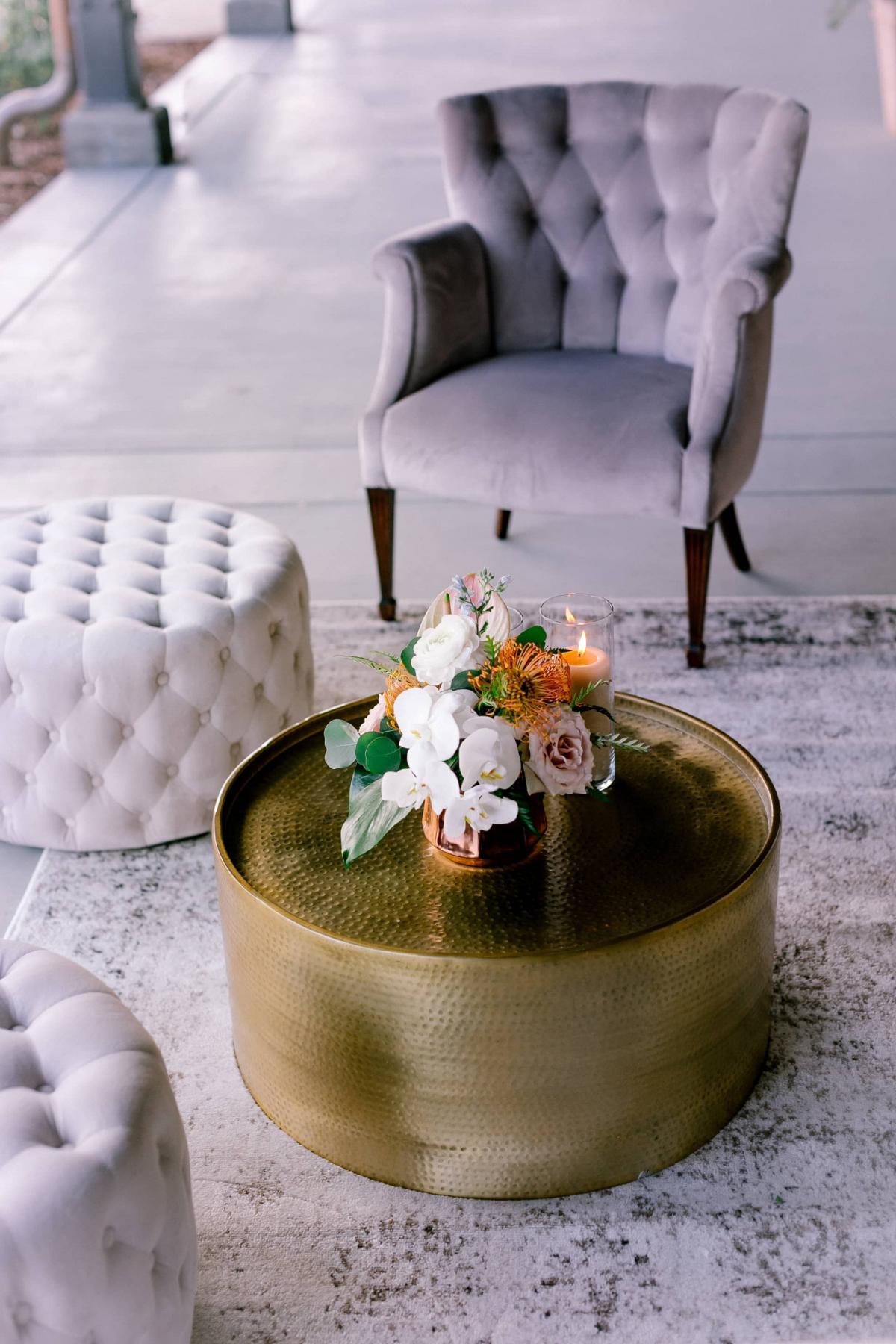 Closeup of Coffee table with Flower Arrangement for Mika & James's Wedding
