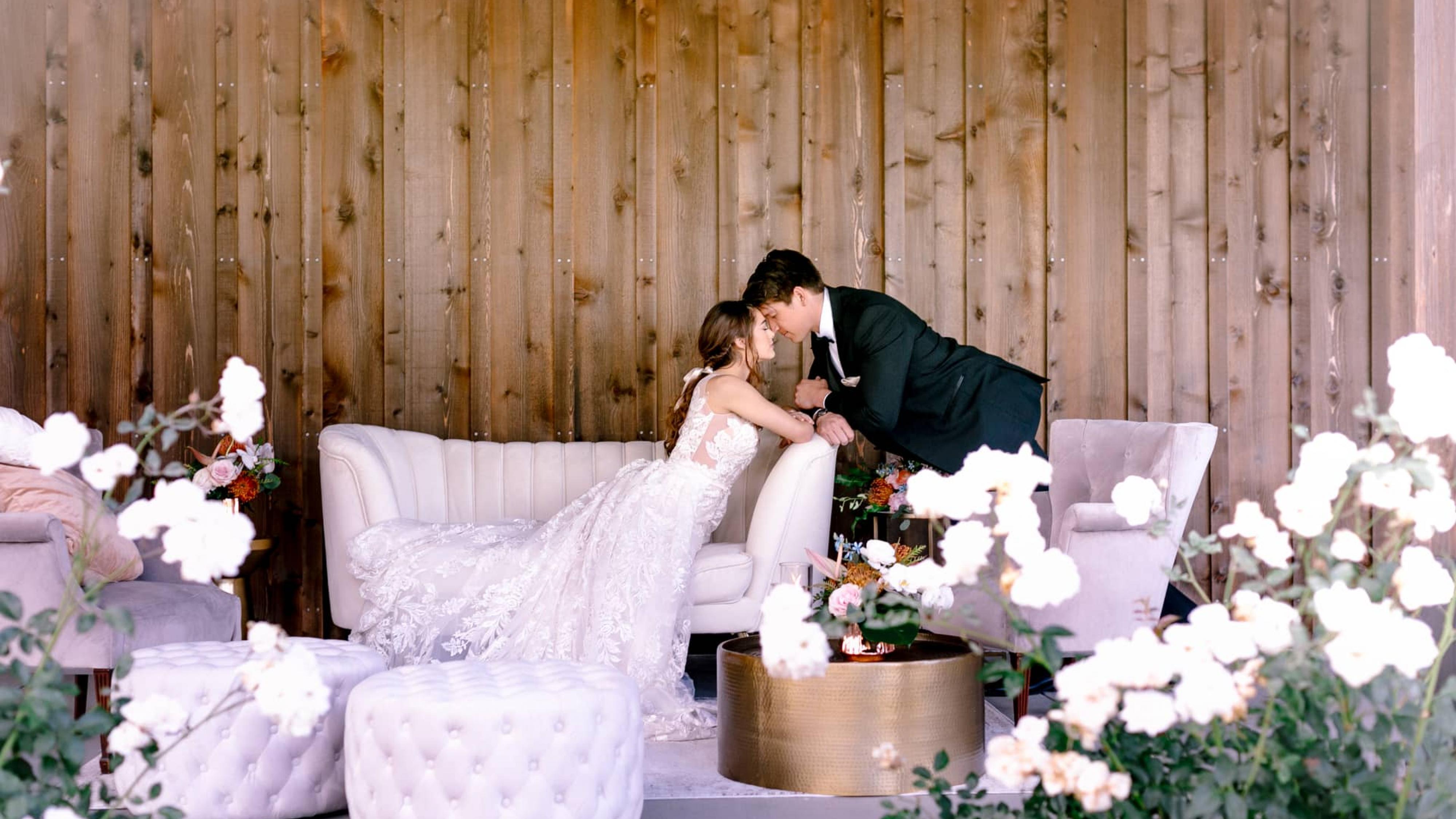 Bride & Groom on Couch at Petros Winery Special Events